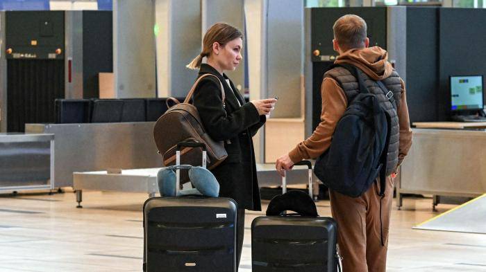 Туристы в аэропорту