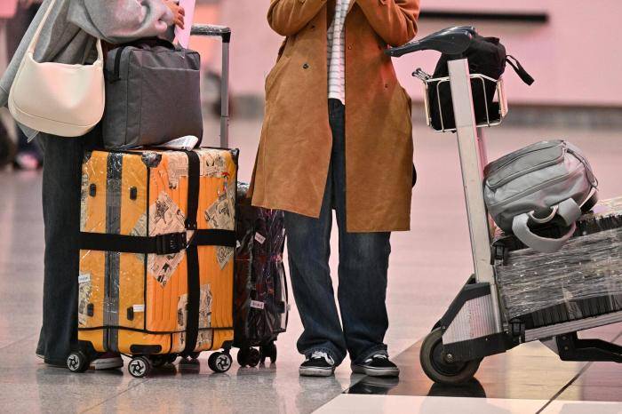 Пассажиры у стоек регистрации в терминале С аэропорта Шереметьево